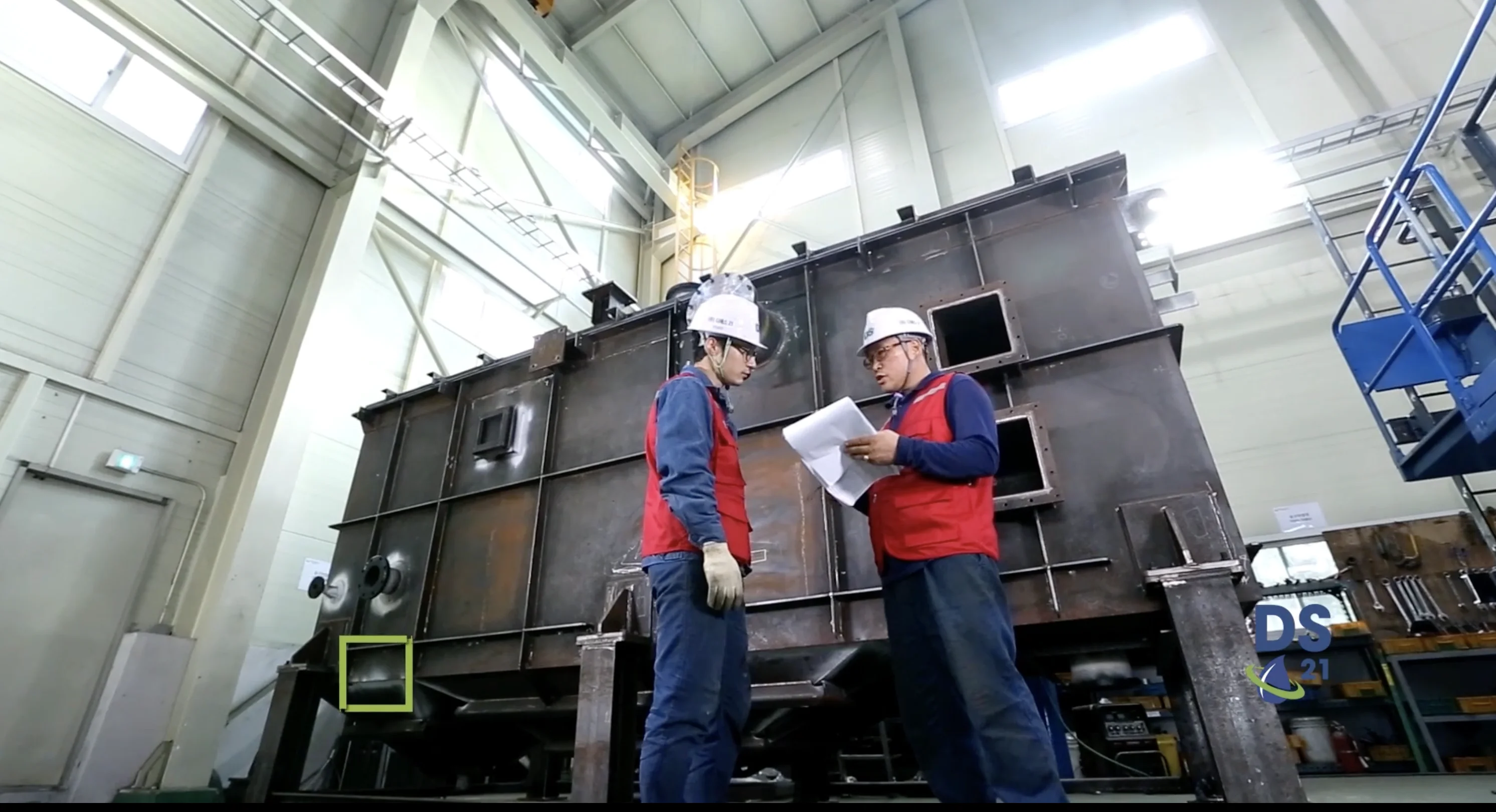 Corrugated Plate Interceptor Plate Oil-Water Separator with workers talking in front of equipment